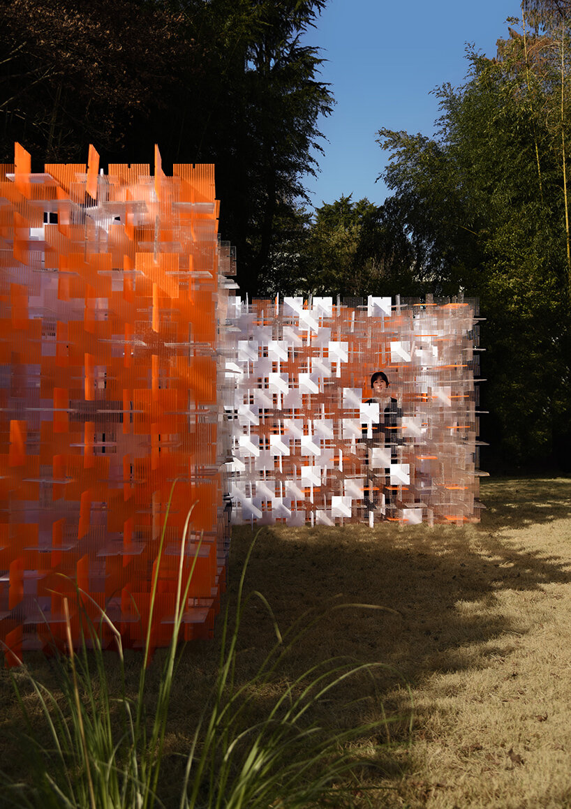 over 3,500 recyclable polycarbonate panels assemble paired cubes pavilion in korea