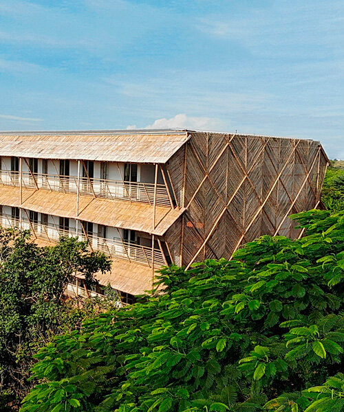 BLOOM screens girl dormitory's concrete skeleton with woven bamboo skin in cambodia