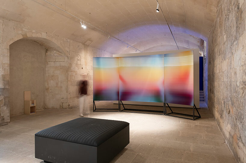 lenticular artworks explore color of light in BMW's green ray exhibition at rencontres d'arles