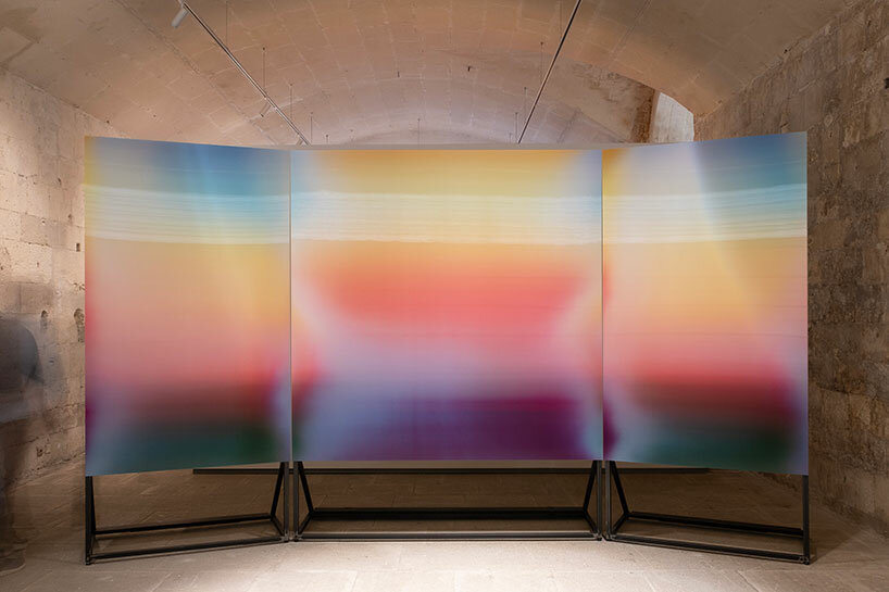 lenticular artworks explore color of light in BMW's green ray exhibition at rencontres d'arles