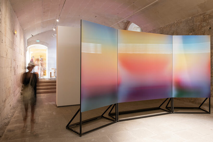 lenticular artworks explore color of light in BMW's green ray exhibition at rencontres d'arles