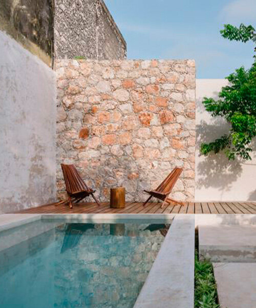 taller mexicano de arquitectura preserves casa deco's original textured stone walls in mérida