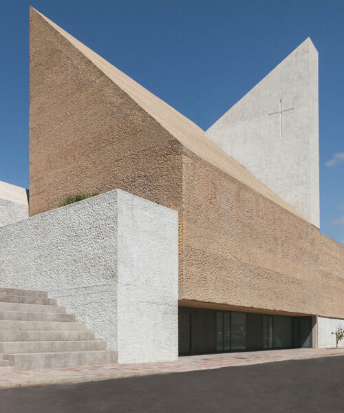 beautell arquitectos' tenerife church is a pair of cyclopean concrete volumes