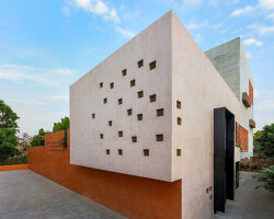 sona reddy animates brutalist home with breeze blocks and geometric openings in hyderabad