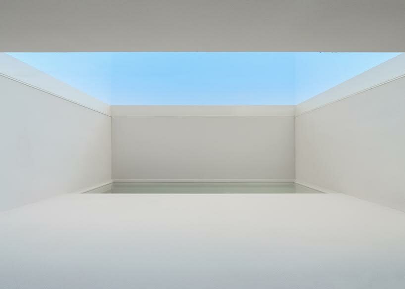 'light garden' atriums dot all-white wooden shell in japanese residence