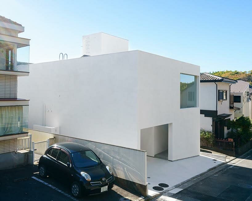 'light garden' atriums dot all-white wooden shell in japanese residence