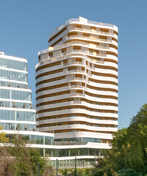 hamonic+masson's emblem raises high-rise undulating office unit in france