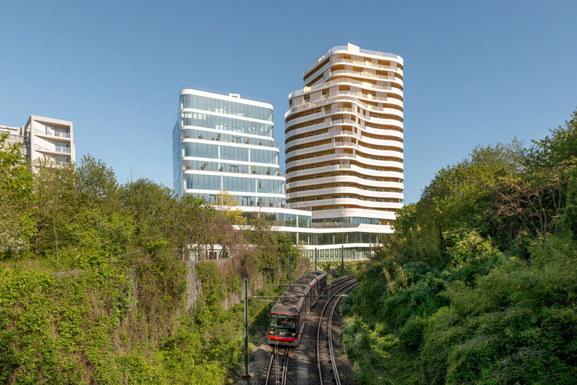 hamonic+masson's emblem raises high-rise undulating office unit in france