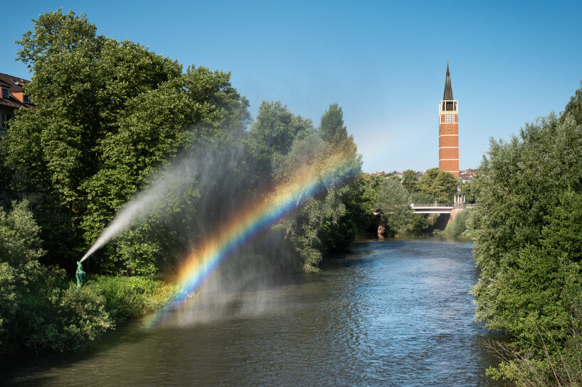 studio brynjar & veronika's fountain sprays ephemeral rainbow across river enz at ornamenta