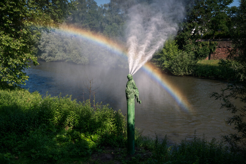 studio brynjar & veronika's fountain sprays ephemeral rainbow across river enz at ornamenta