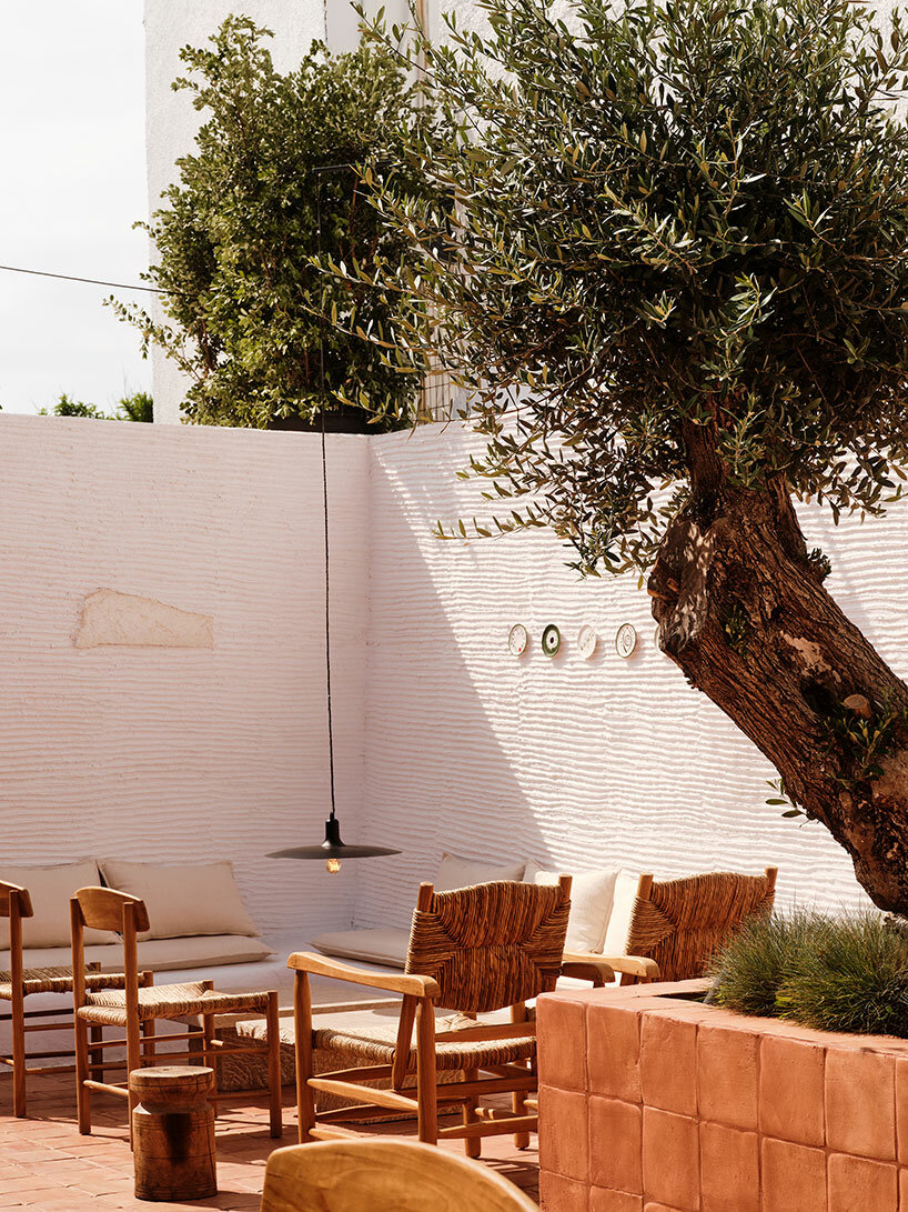 maison bardot gallery in antiparos, greece, blends cycladic architecture & mid-century design