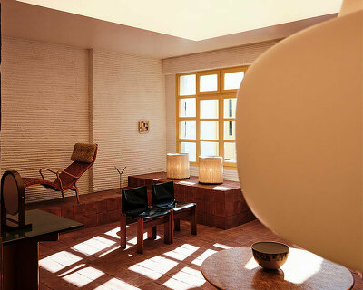 maison bardot gallery in antiparos, greece, blends cycladic architecture & mid-century design