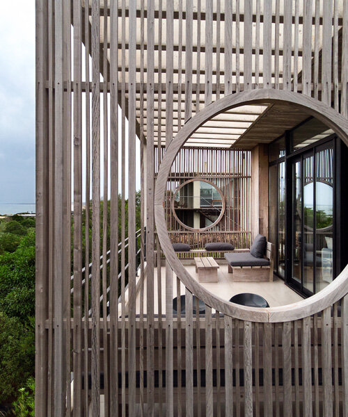 timber screens envelop martin gomez arquitectos' boji beach house in uruguay