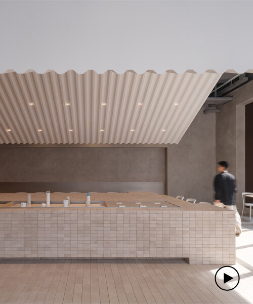 neri&hu suspends imprint of corrugated roof inside blue bottle coffee's shanghai branch