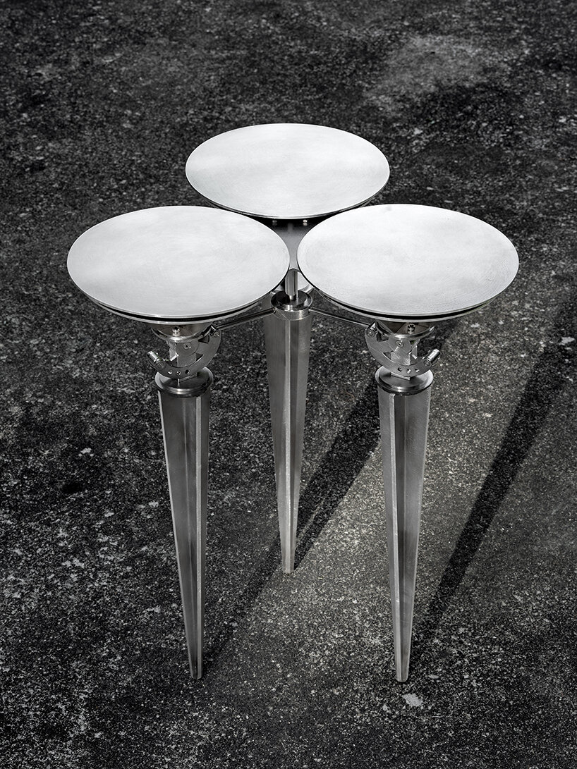 terrain-adaptive cone stool by sukchulmok studio reinterprets common landscape pegs