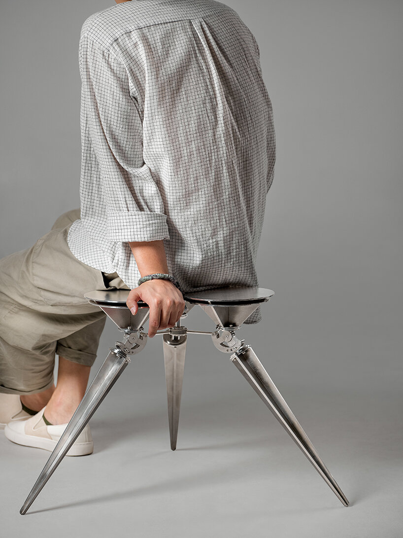 terrain-adaptive cone stool by sukchulmok studio reinterprets common landscape pegs