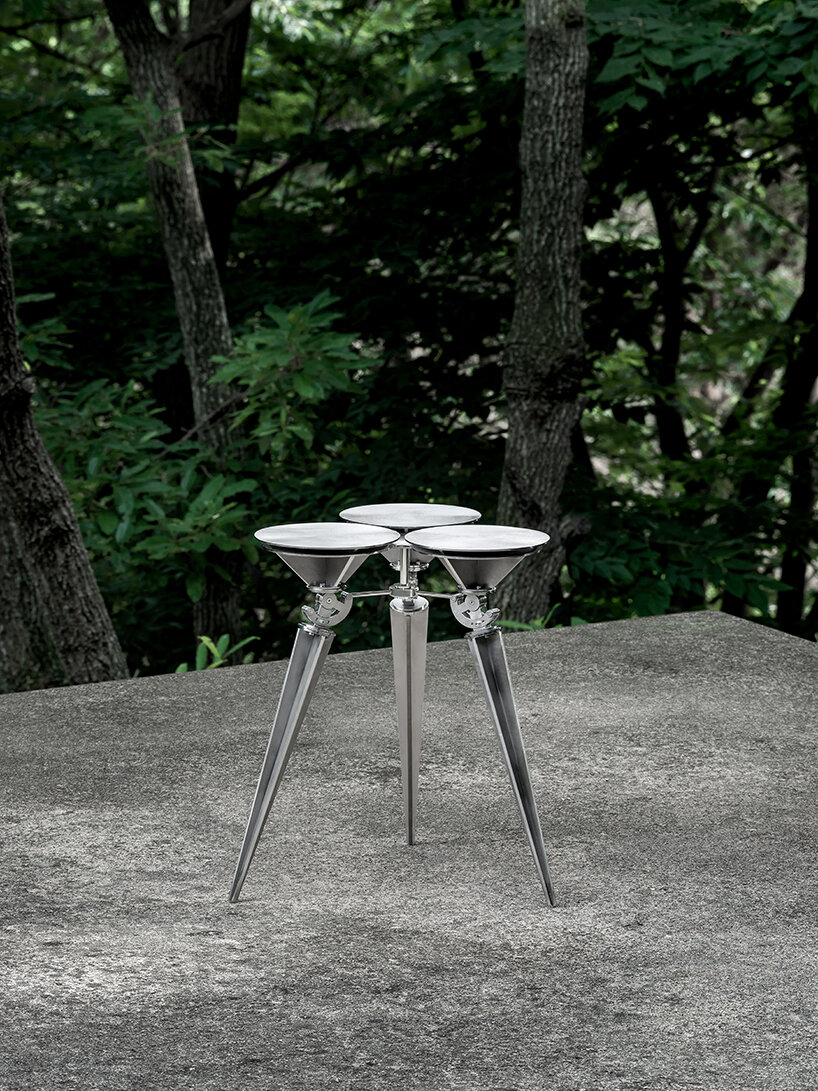 terrain-adaptive cone stool by sukchulmok studio reinterprets common landscape pegs