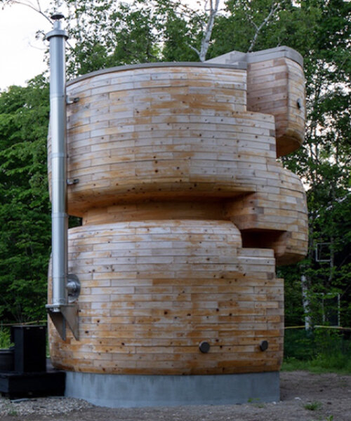 VUILD stacks curving prefabricated wood blocks to shape tower sauna in hokkaido