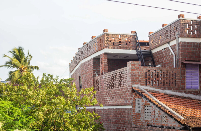 onebulb architecture's red fort brick house tucks into compact plot in india