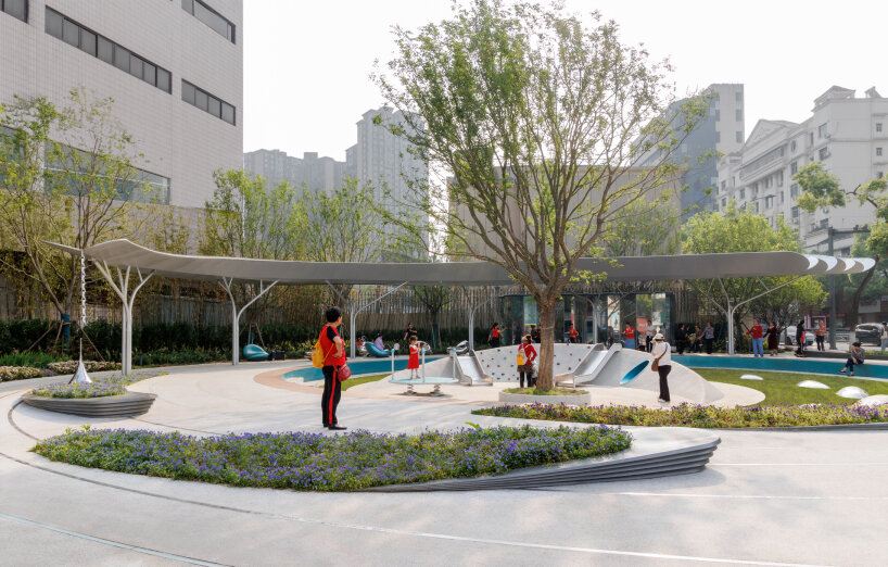 concentric pathways and gardens encircle HID landscape architecture's connective urban node in hubei, china