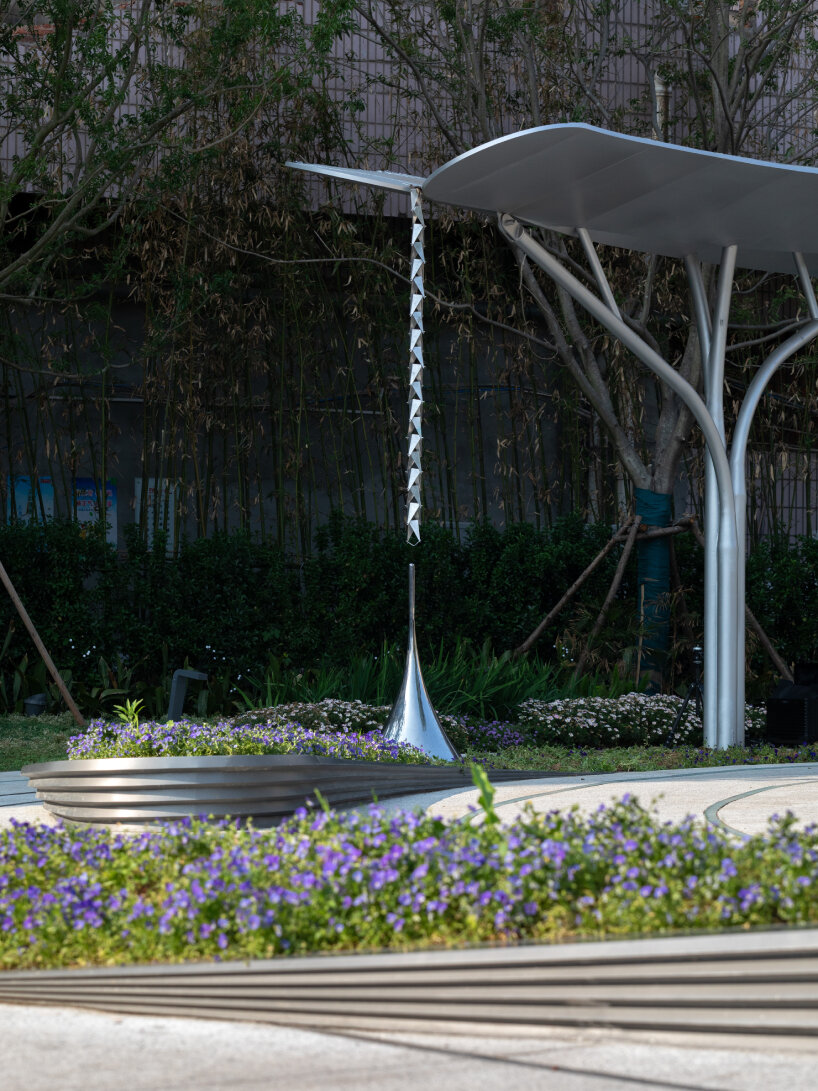 concentric pathways and gardens encircle HID's connective urban node in hubei, china