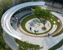 concentric pathways and gardens encircle HID's connective urban node in hubei, china