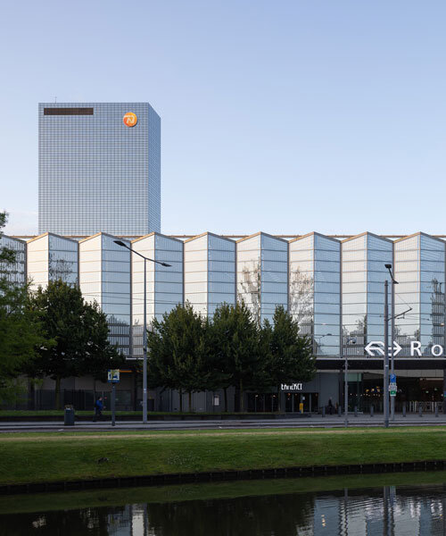 andrew campion captures transformative qualities of light within rotterdam central station