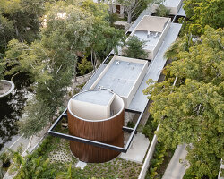 lush vegetation and stone walls enclose taller mexicano de arquitectura's hotel spa in mexico