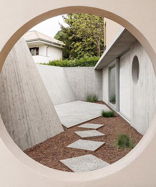 this modern underground courtyard shaped by italian architects larotonda + tregnago