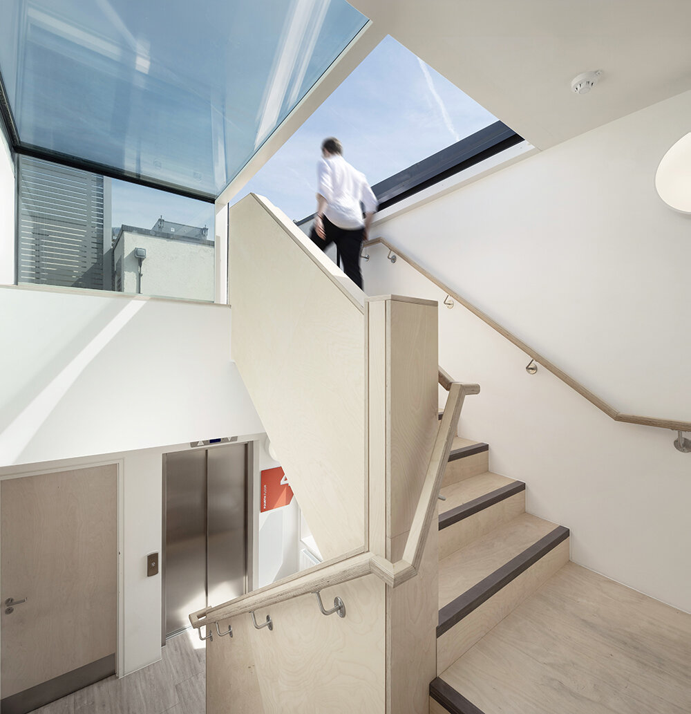 corstorphine & wright carves striking semi-circular void on office building in london