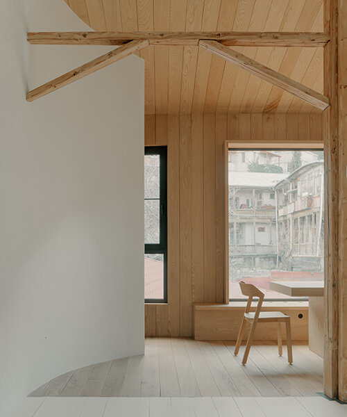TIMM architecture transforms a tbilisi attic into this contemporary 'birdsnest house'