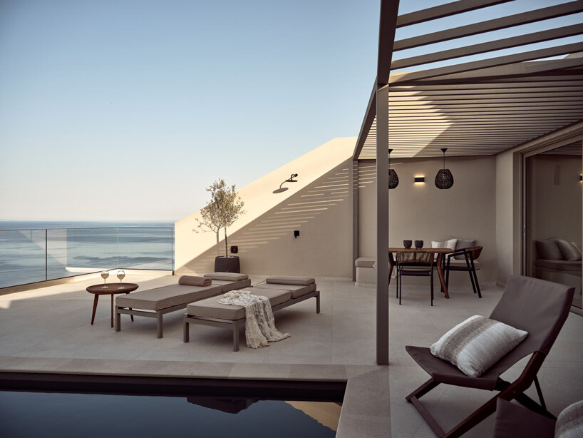 urban soul project's yoma cove suites emerge from zakynthos island's cliffside