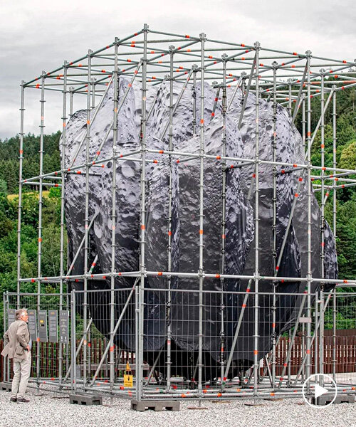 thomas medicus' public installation encloses 3D asteroid in cuboid scaffolding