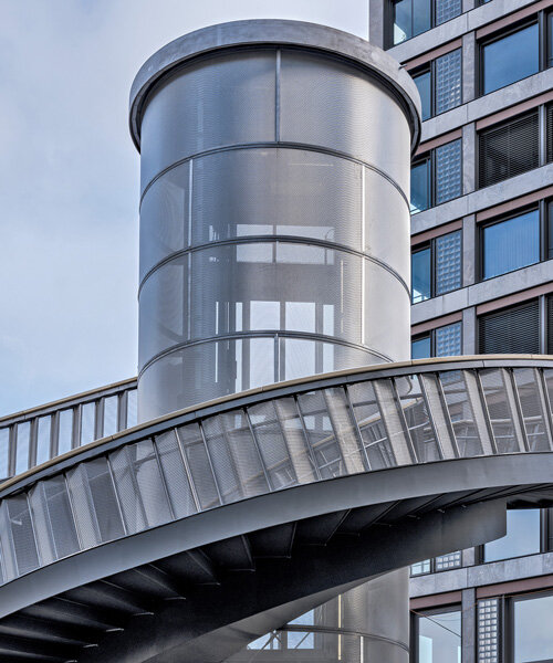 industrial negrelli footbridge coils and stretches above zürich's dense railway network