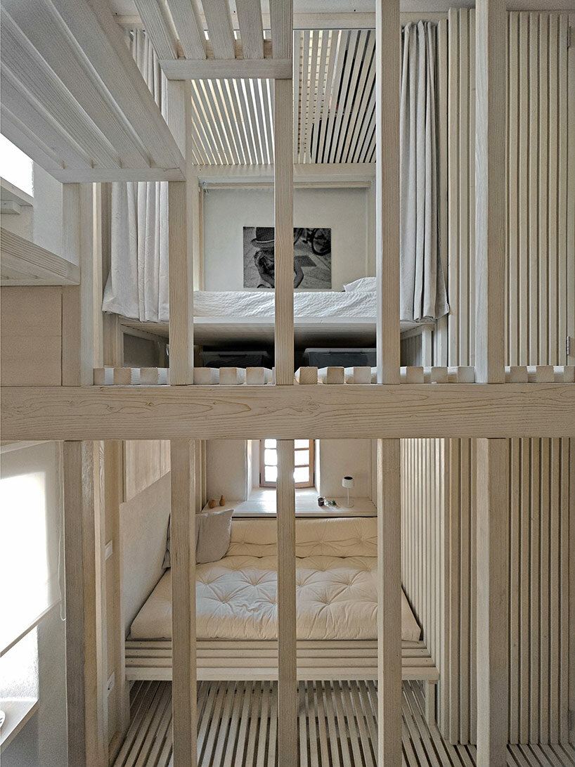OFIS arhitekti infuses croatia's historic stone 'pier lighthouse' with modern interiors
