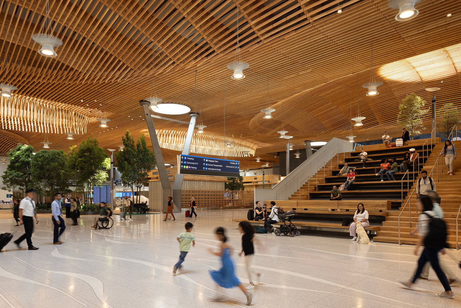 world's largest mass timber airport opens to travelers in portland