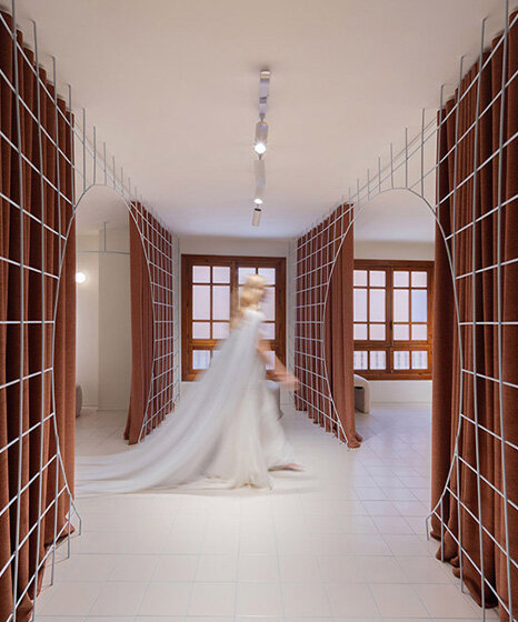 bridal catwalk meets flexible fitting rooms in terracotta-hued spanish store by L'AURA ORTÍN