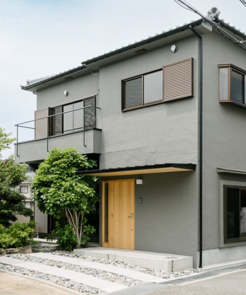 double-level foyer puts modern twist on traditional japanese doma in house in itama