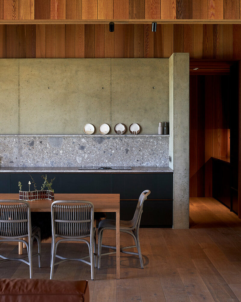 fearon hay's 'te arai' house frames dunes through timber shutters