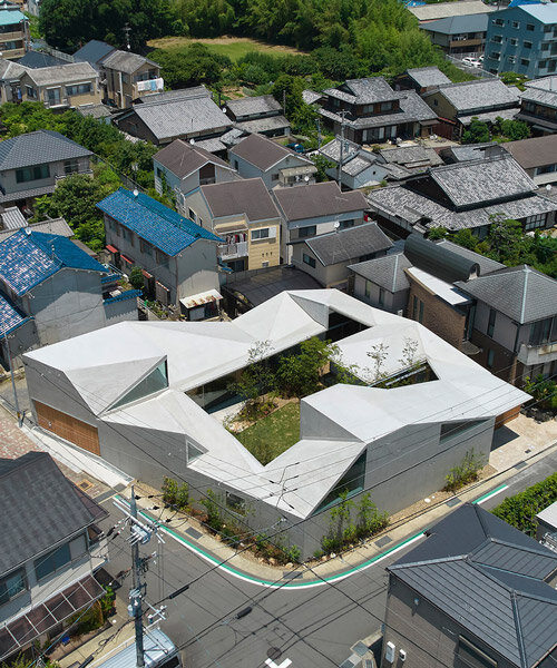 faceted rooftop encloses architect tomohiro hata's house in muko, kyoto