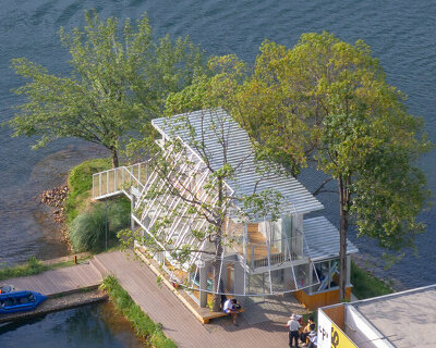 tree canopies shade lakeside commercial hub by YIIIE architects in chengdu