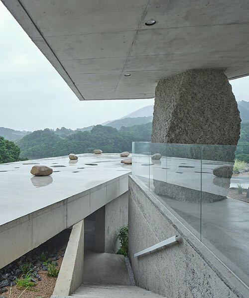 nameless architecture's concretewall café is an austere rock garden in korea