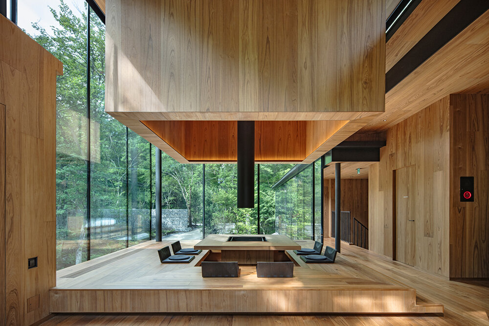 KEIN HOTEL KITAKARUIZAWA IRORI combines wood and glass in the middle of a Japanese forest