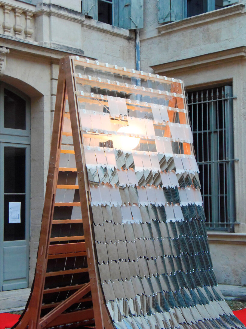 kinetic mirror pavilion's living facade rhythmically reflects french monument for paris 2024