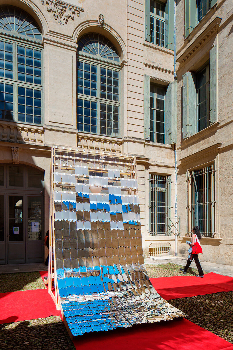 kinetic mirror pavilion's living facade rhythmically reflects french monument for paris 2024