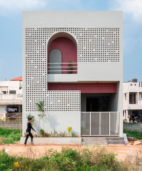 perforated terracotta facade enfolds rahul pudale's porous adobe in india