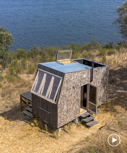 clad in cork bark, madeiguincho's terra tows mirror their agricultural site in portugal