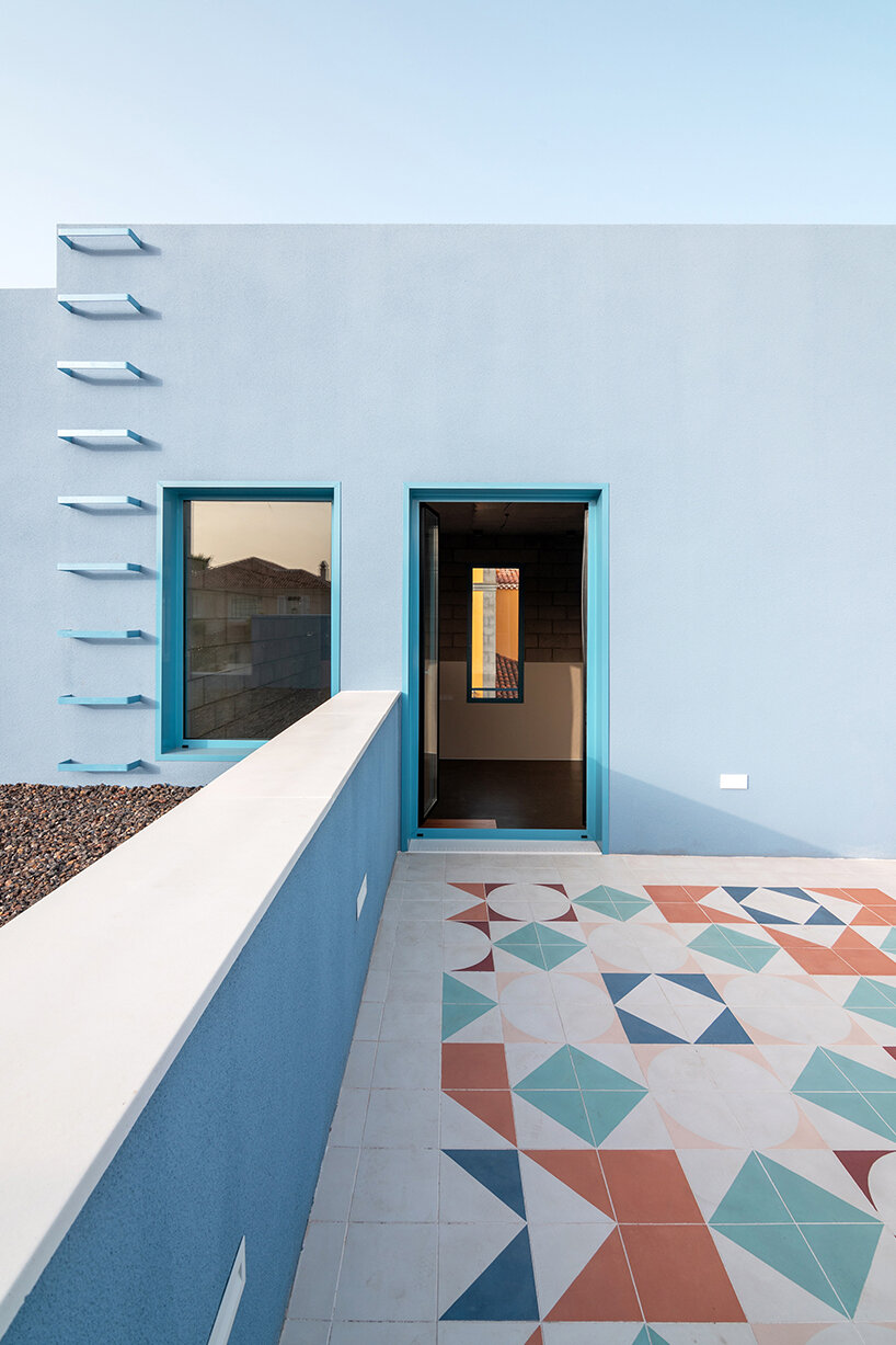 FIVE OH FIVE's vibrant blue brutalist house blends with the sky above tenerife