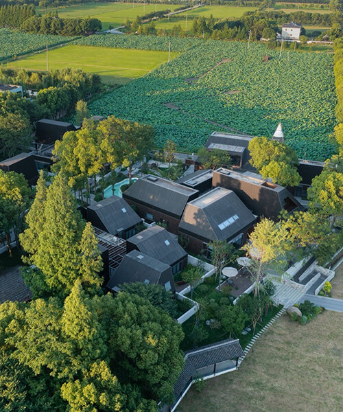 SHUISHI architects' orieco club hotel is a cluster of bamboo-clad modules