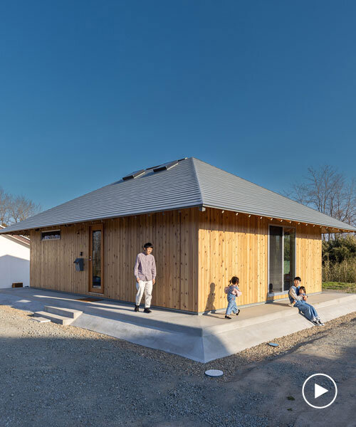 wooden house by architrip extends fluily into surrounding garden in japan